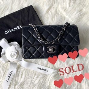 Chanel Mini Classic Flap. Black lambskin with ruthenium hardware. Series 20